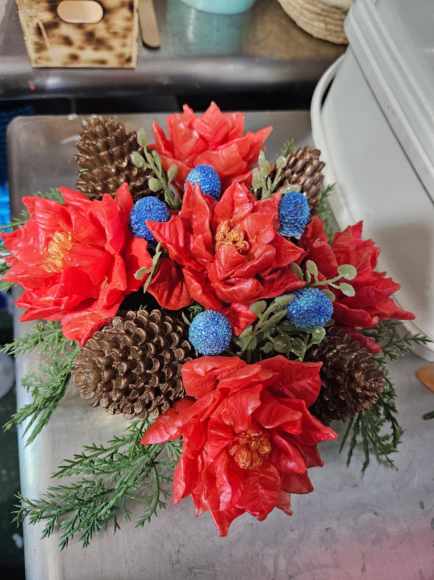 Pinecone and pointsettia basket