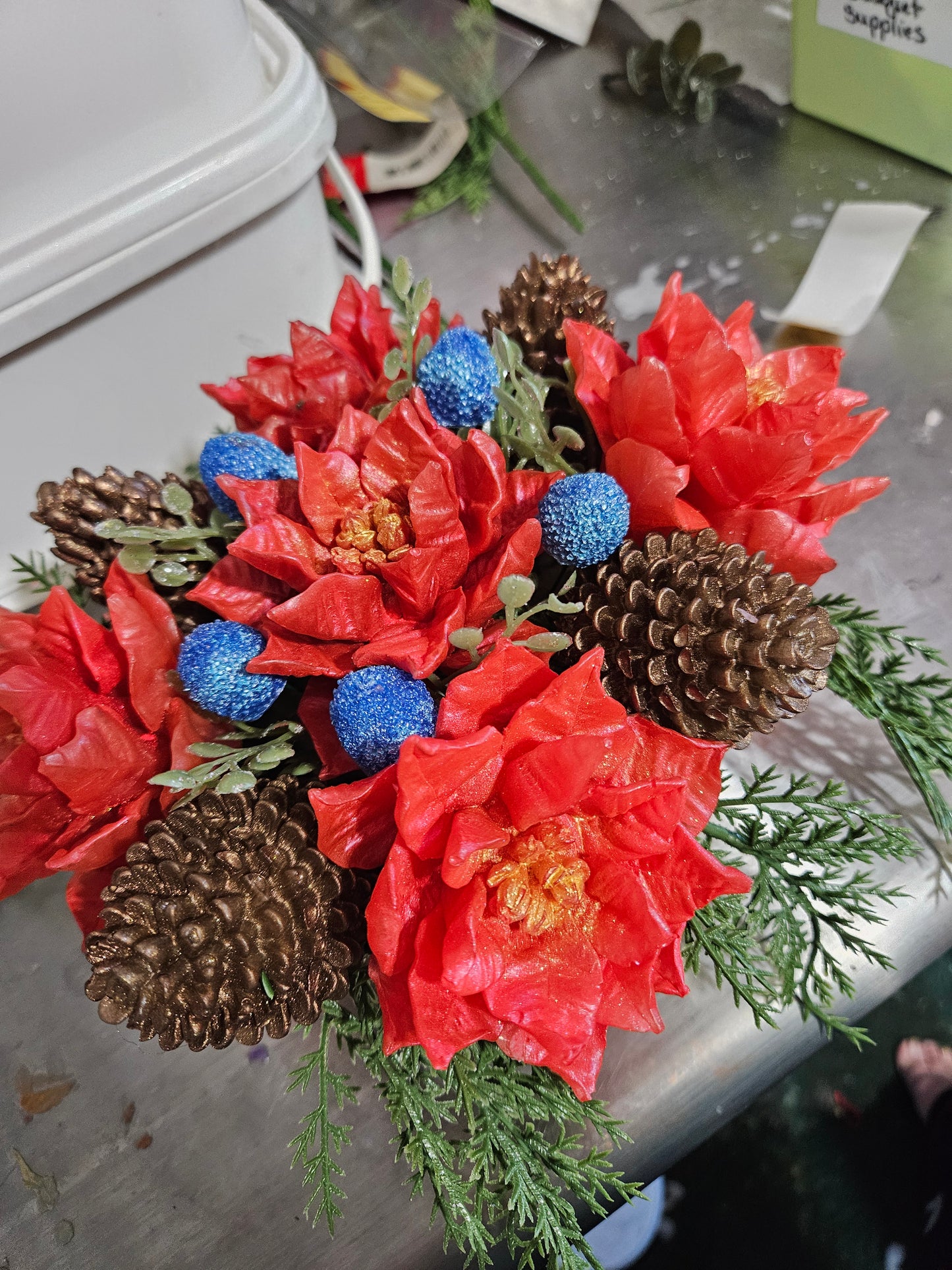Pinecone and pointsettia basket