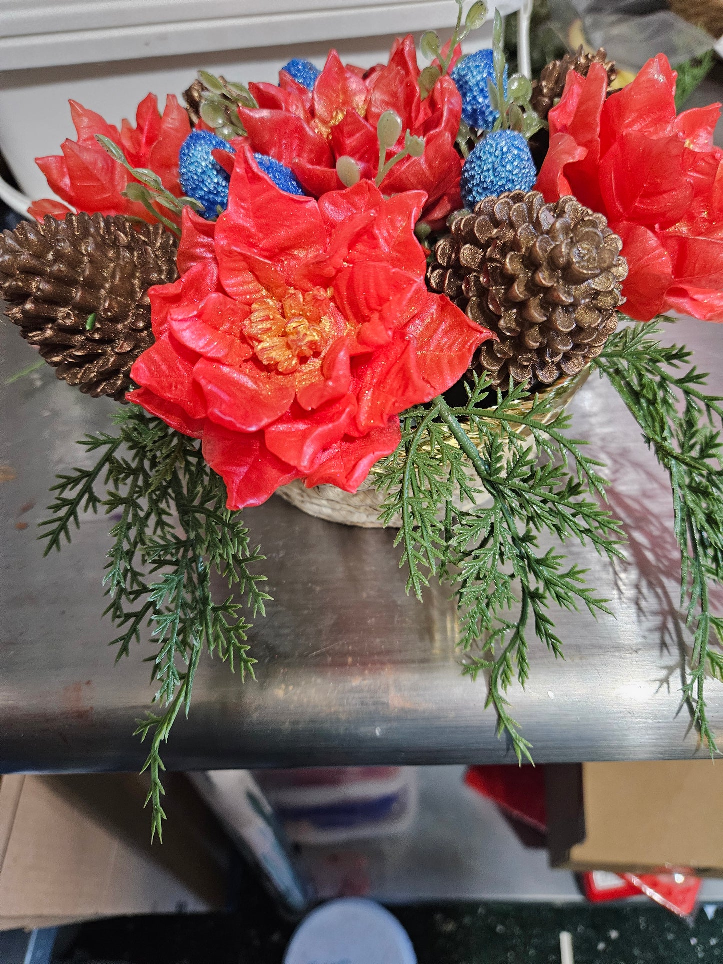 Pinecone and pointsettia basket